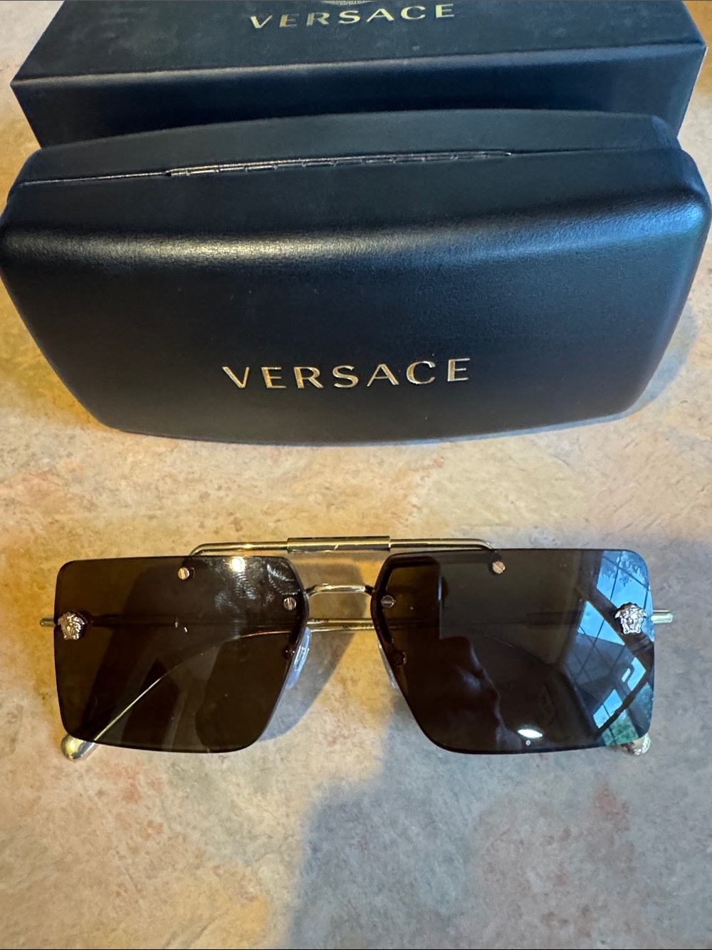 Versace Black Shield Sunglasses with Gold Frame and Medusa Detail